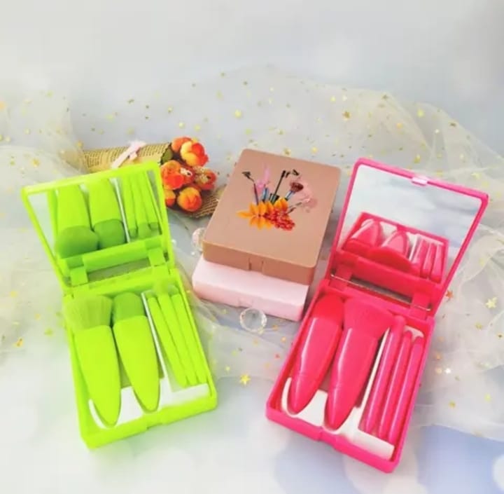 Pink mini makeup brush set with mirror