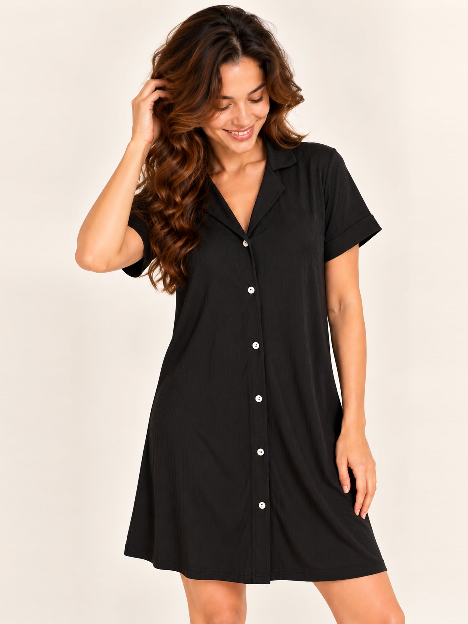 Ashanthi modal sleep shirt in Black – front view, relaxed pose